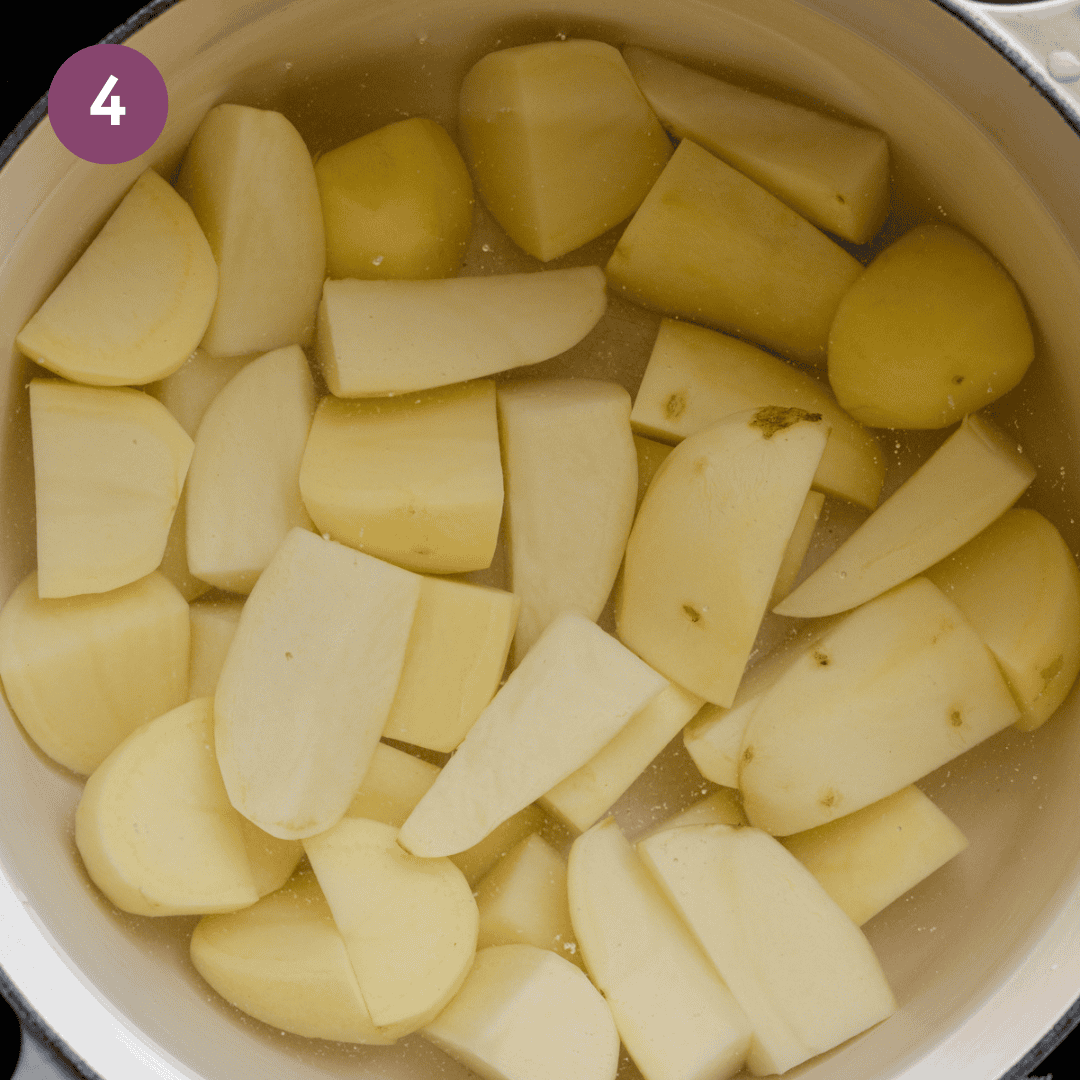 peeled and chopped potatoes in a saucepan, covered with water.