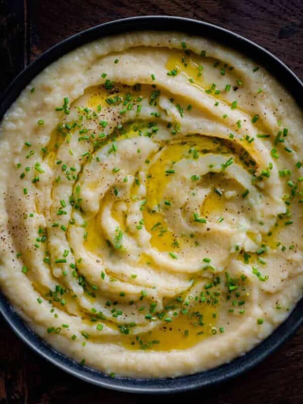 vegan mashed potatoes with butter and chives in a bowl