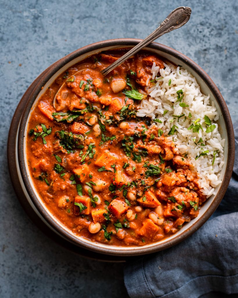 bowl of West African Peanut Stew served over white rice 