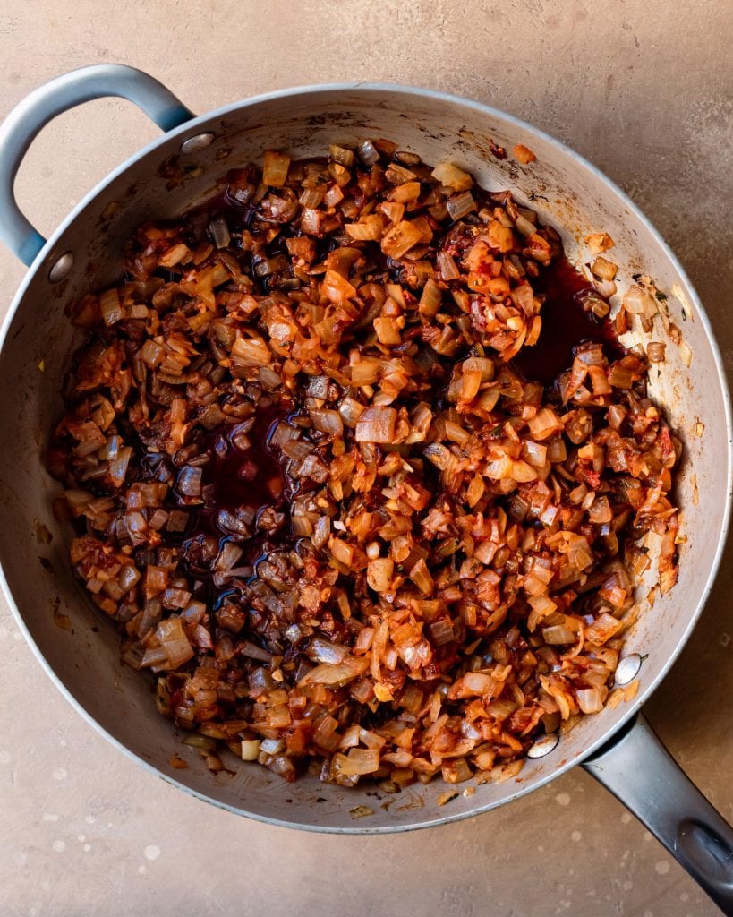 onions with red wine in saute pan