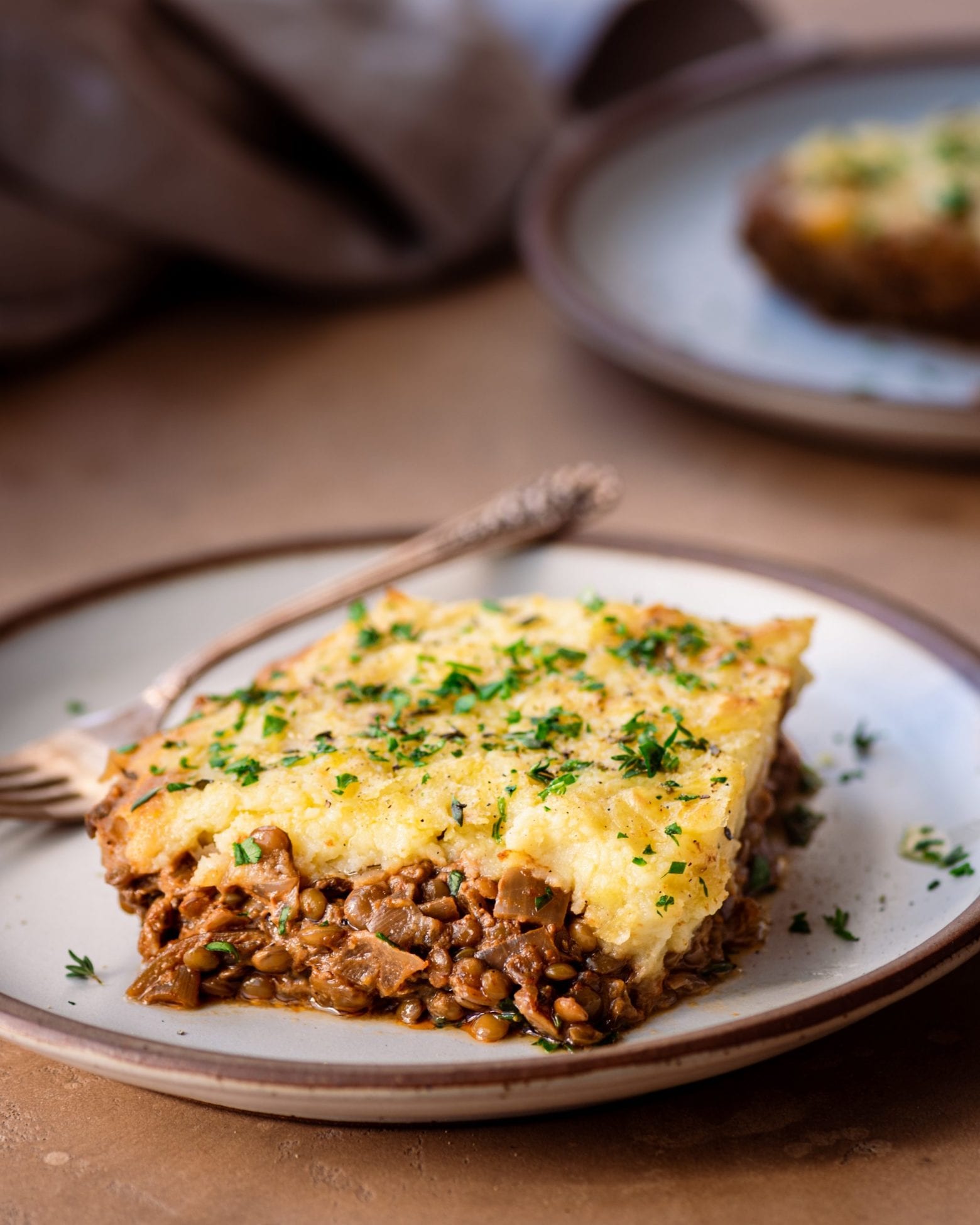 slice of vegan lentil shepherd's pie on plate