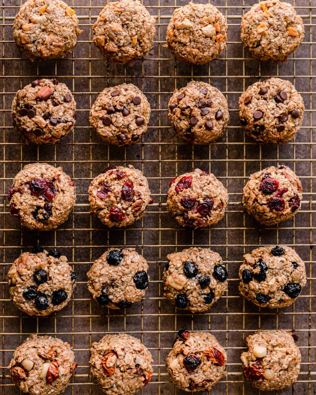 breakfast cookies with different mixins on a wire rack