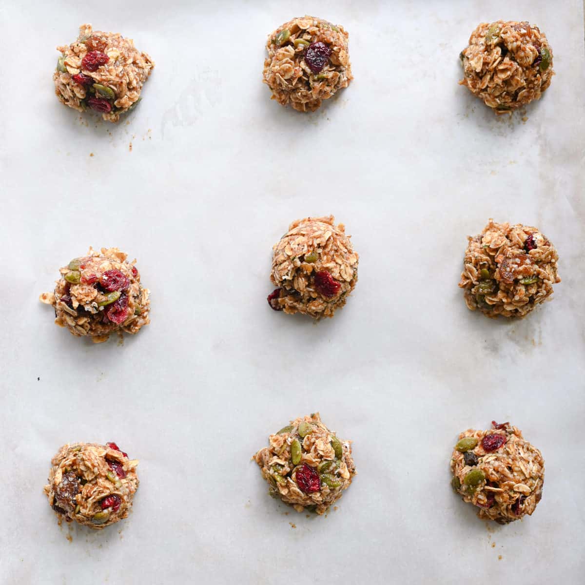 scooped cookie dough on baking sheet.