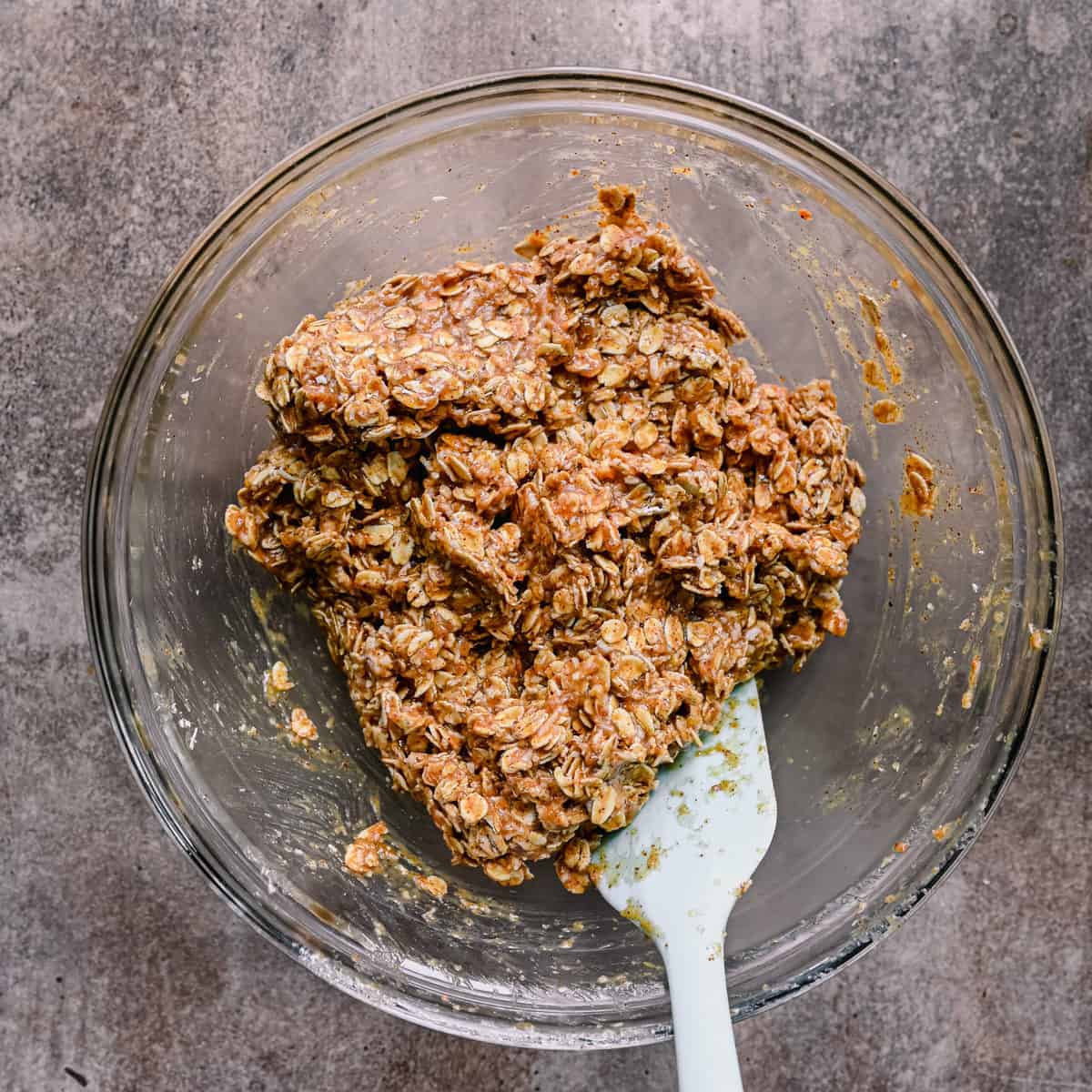 breakfast cookie dough in bowl with spatula.