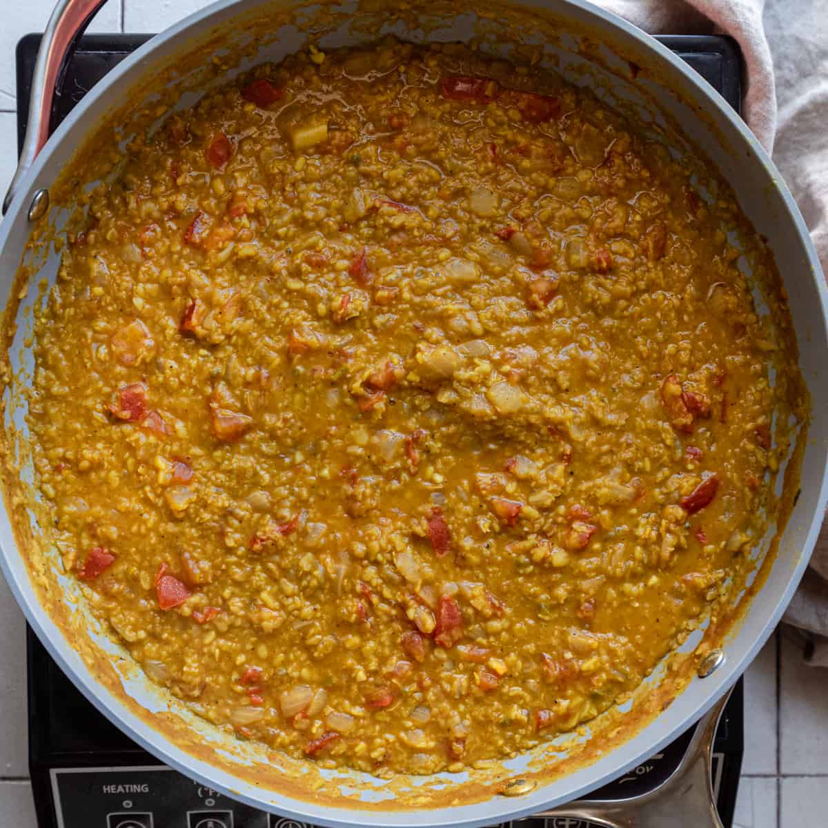 cooked dal with tomatoes