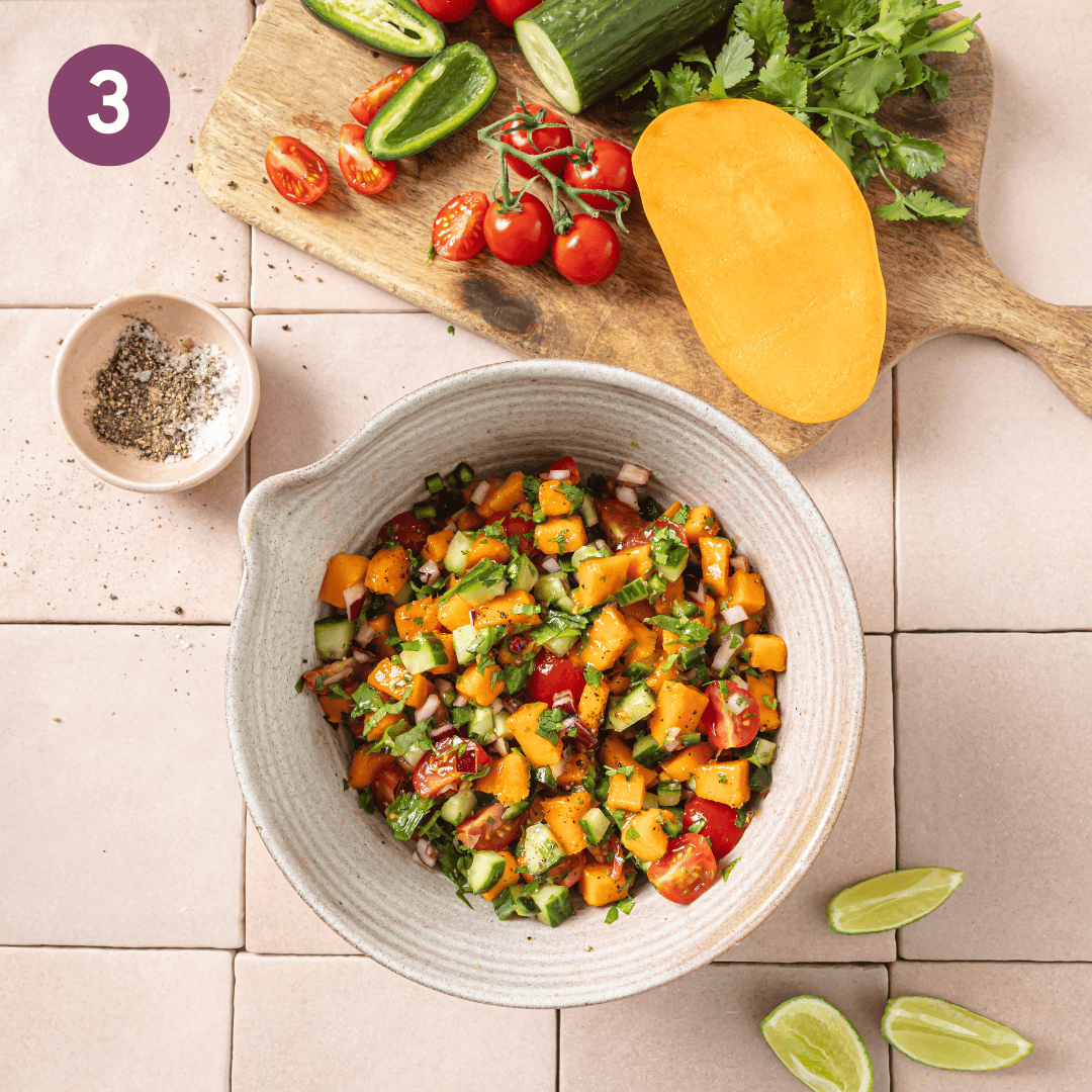 large bowl with mango salsa ingredients in it before after mixed together.