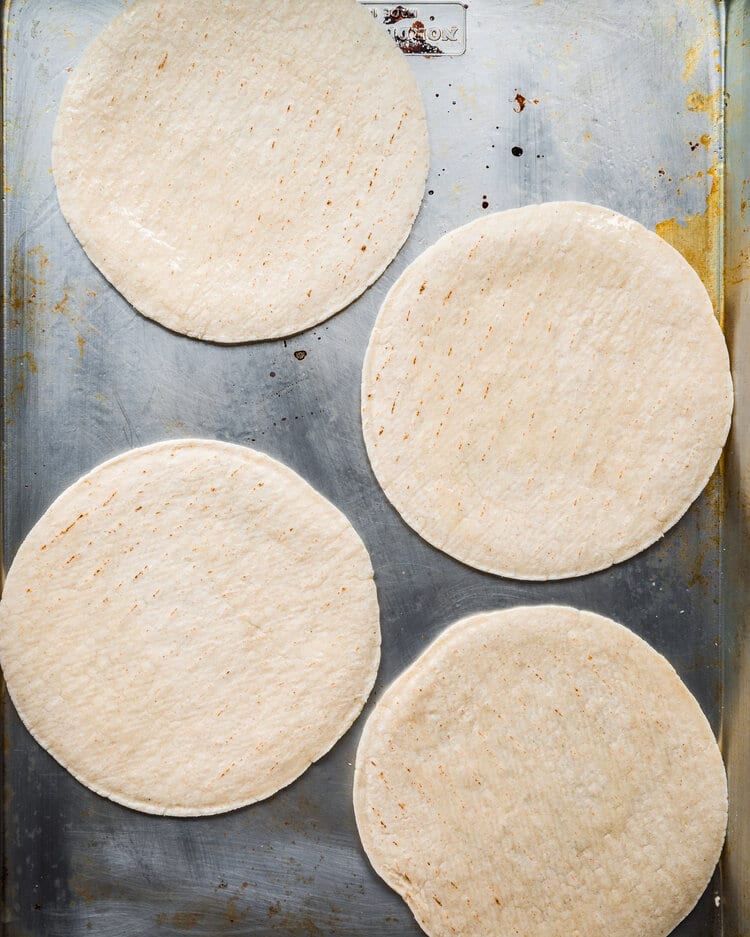 soft tortillas on baking tray