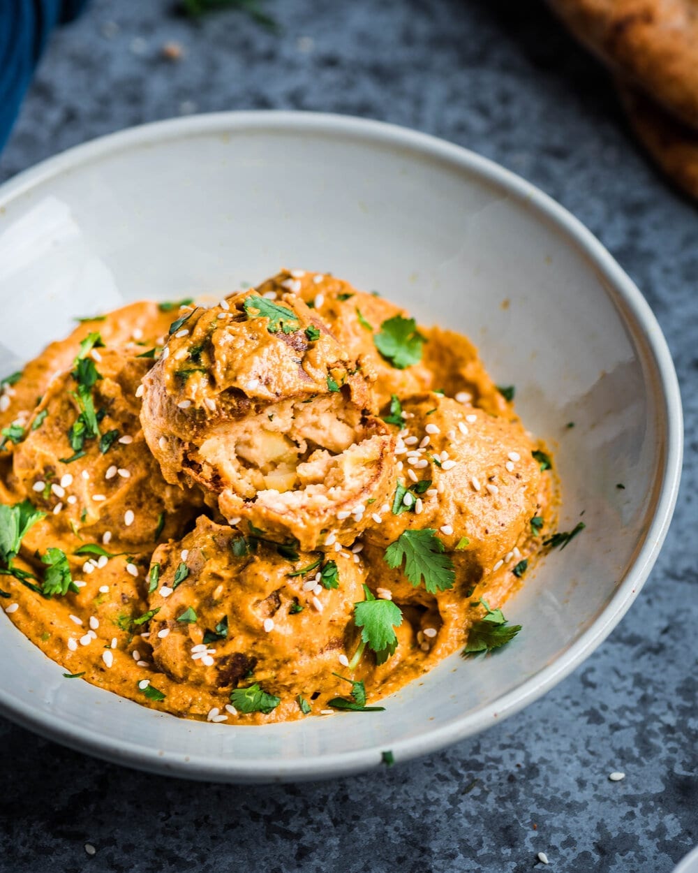 a bowl of restaurant-style vegan malai kofta.