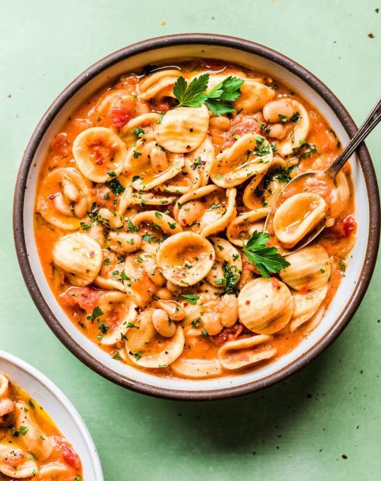 Italian white bean and pasta stew in a bowl.