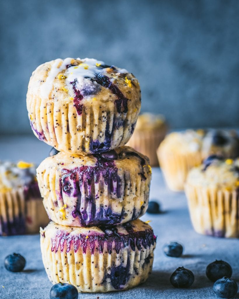 stack of Vegan Blueberry Lemon Poppy Seed Muffins
