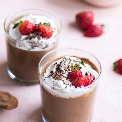 Healthy Chocolate Chia Mousse in glasses with whipped cream
