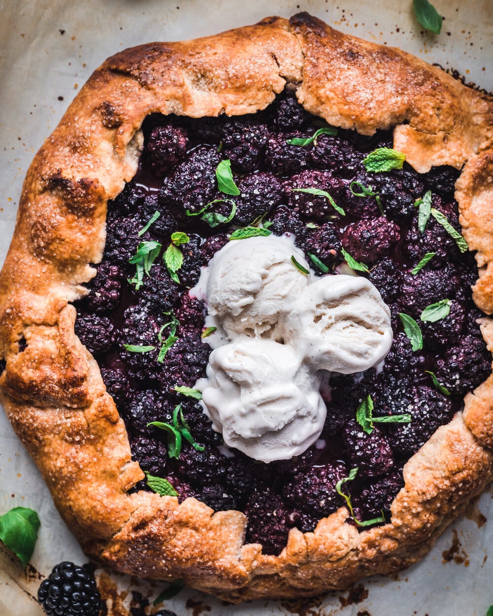Blackberry galette with herbs and ice cream.