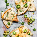 sweet potato quesadillas with jalapenos and avocado on butcher paper