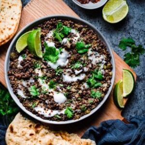 black beluga lentils with yogurt and cilantro in bowl
