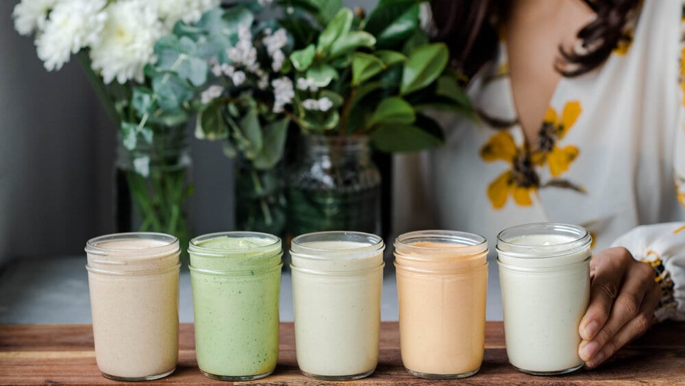 row of vegan cashew creams on cutting board