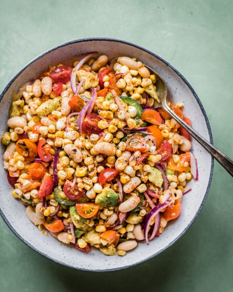 overhead shot of corn salad in a bowl