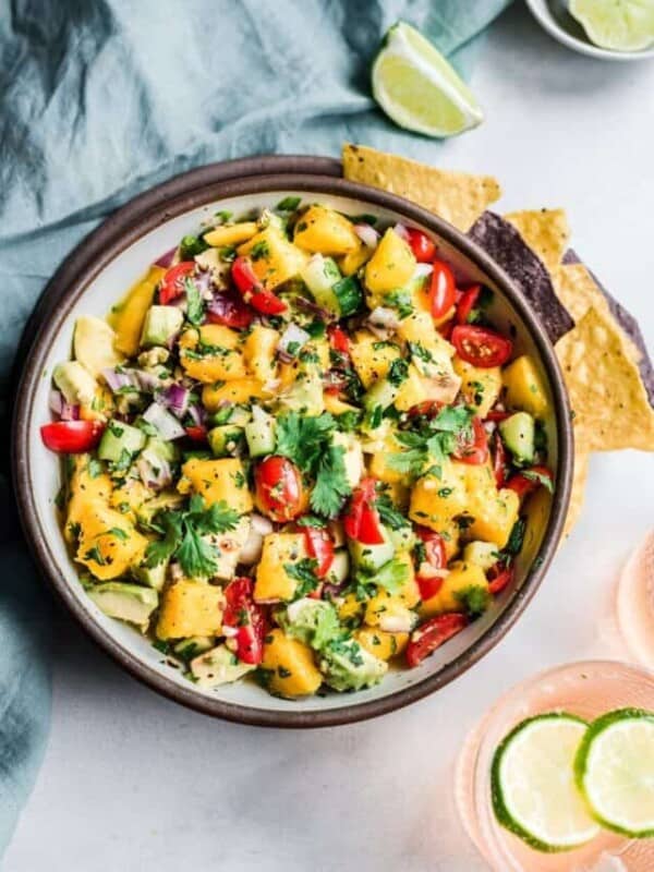Mango avocado salsa in a bowl on a table.