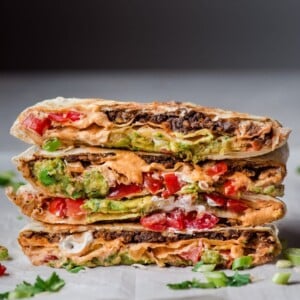 vegan crunchwrap supreme on white background