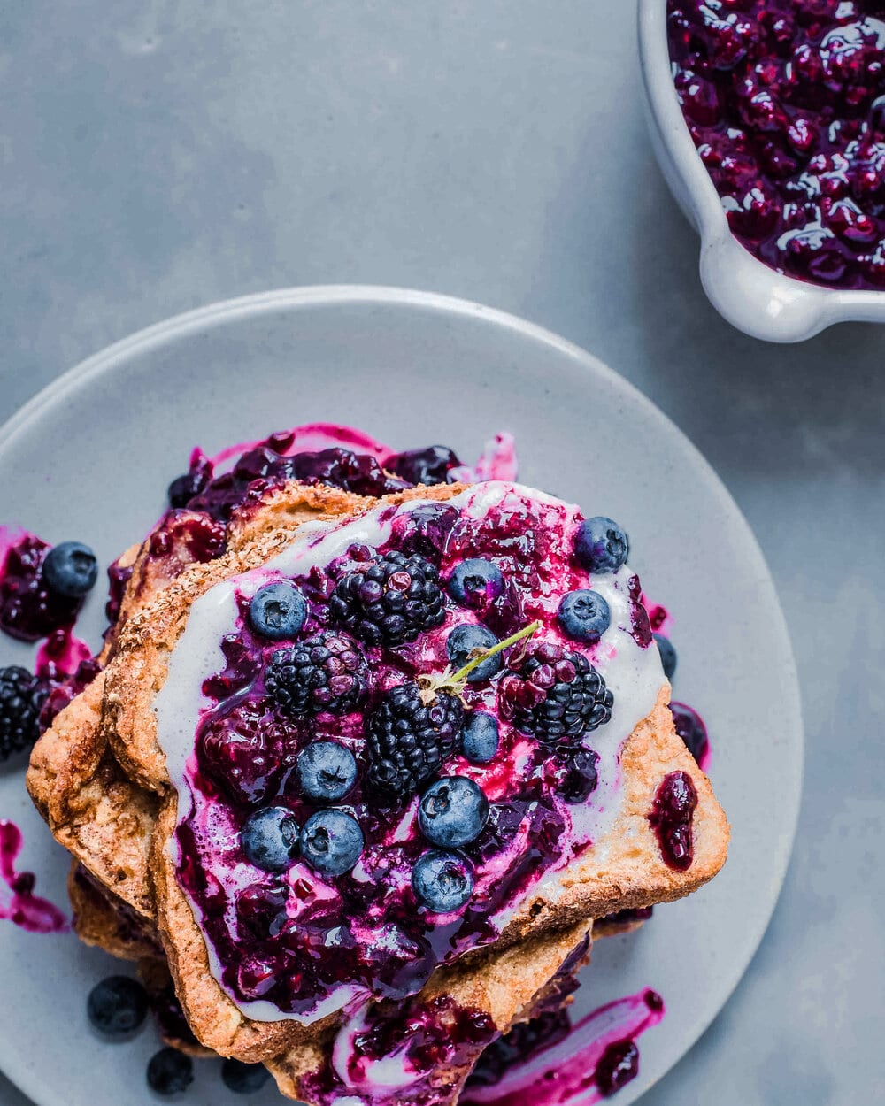 Overhead view of berry french toast on a plate.