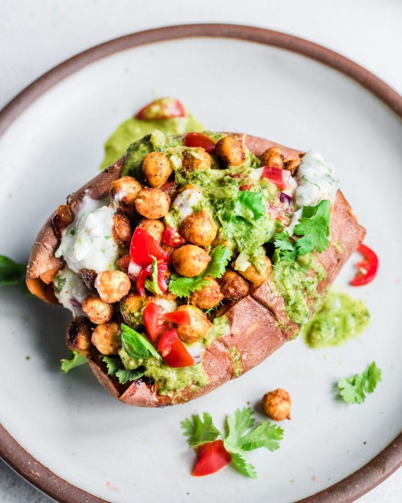 chickpea stuffed sweet potatoes with tomatoes and cilantro