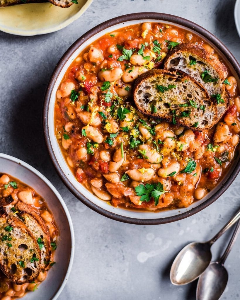 tomato white bean stew with parsley and bread