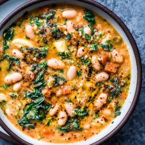 white bean soup with kale and gremolata in bowl