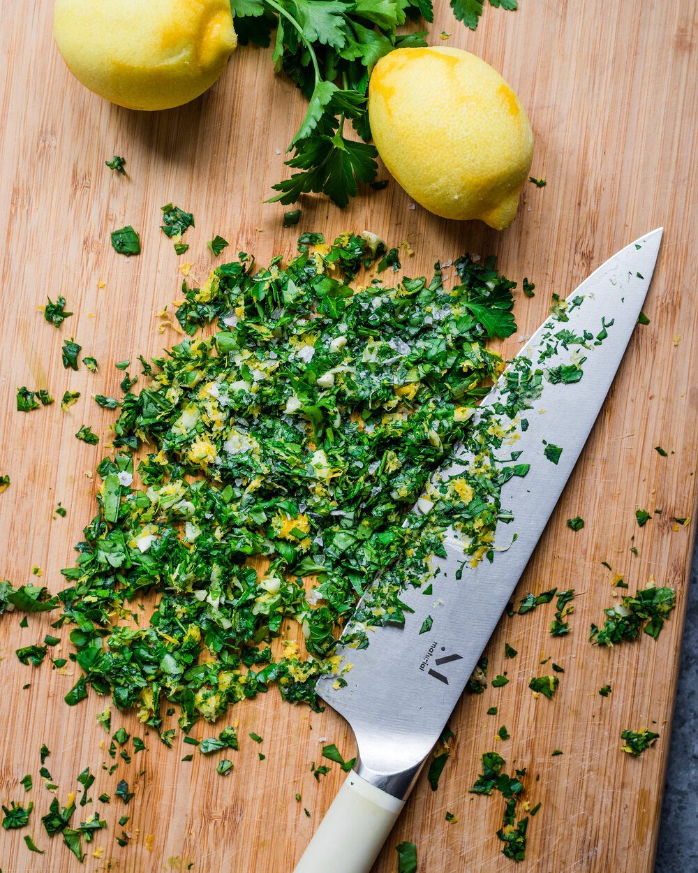 gremolata on cutting board with knife