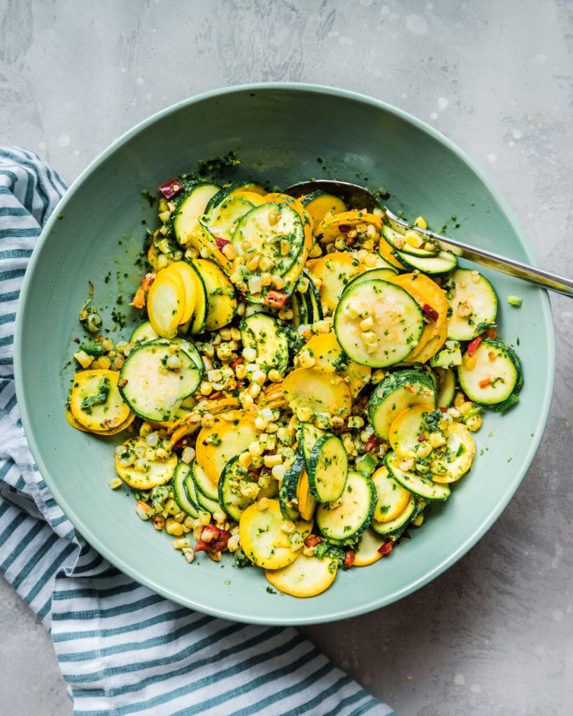zucchini and corn mixed in a bowl