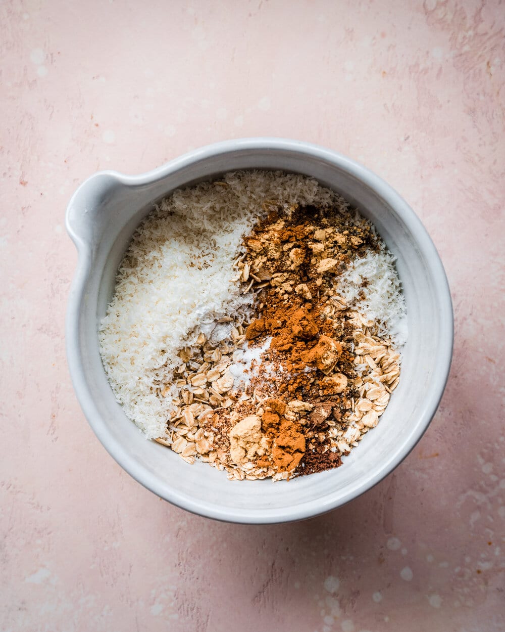flour, baking powder, baking soda, and salt in bowl
