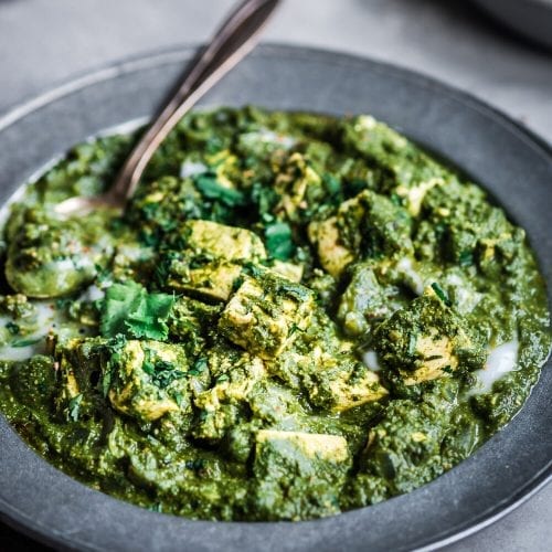 Vegan palak paneer with tofu in metal bowl