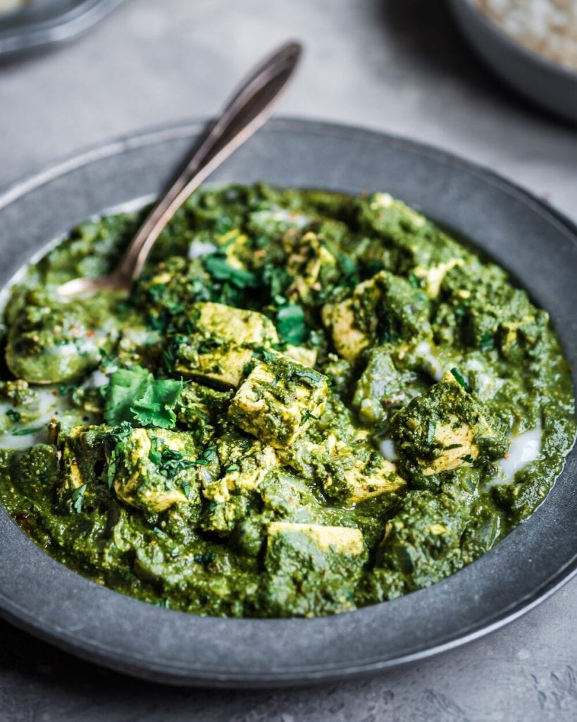 Vegan palak paneer with tofu in metal bowl