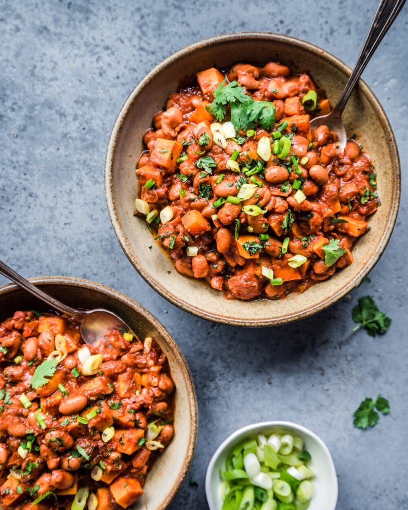 two bowls of vegan sweet potato bean chili