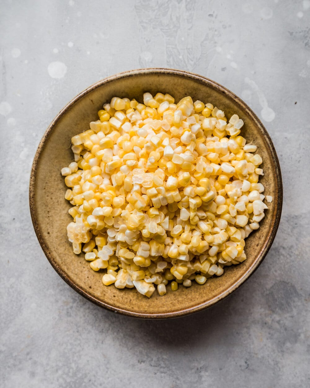shaved corn in a bowl.
