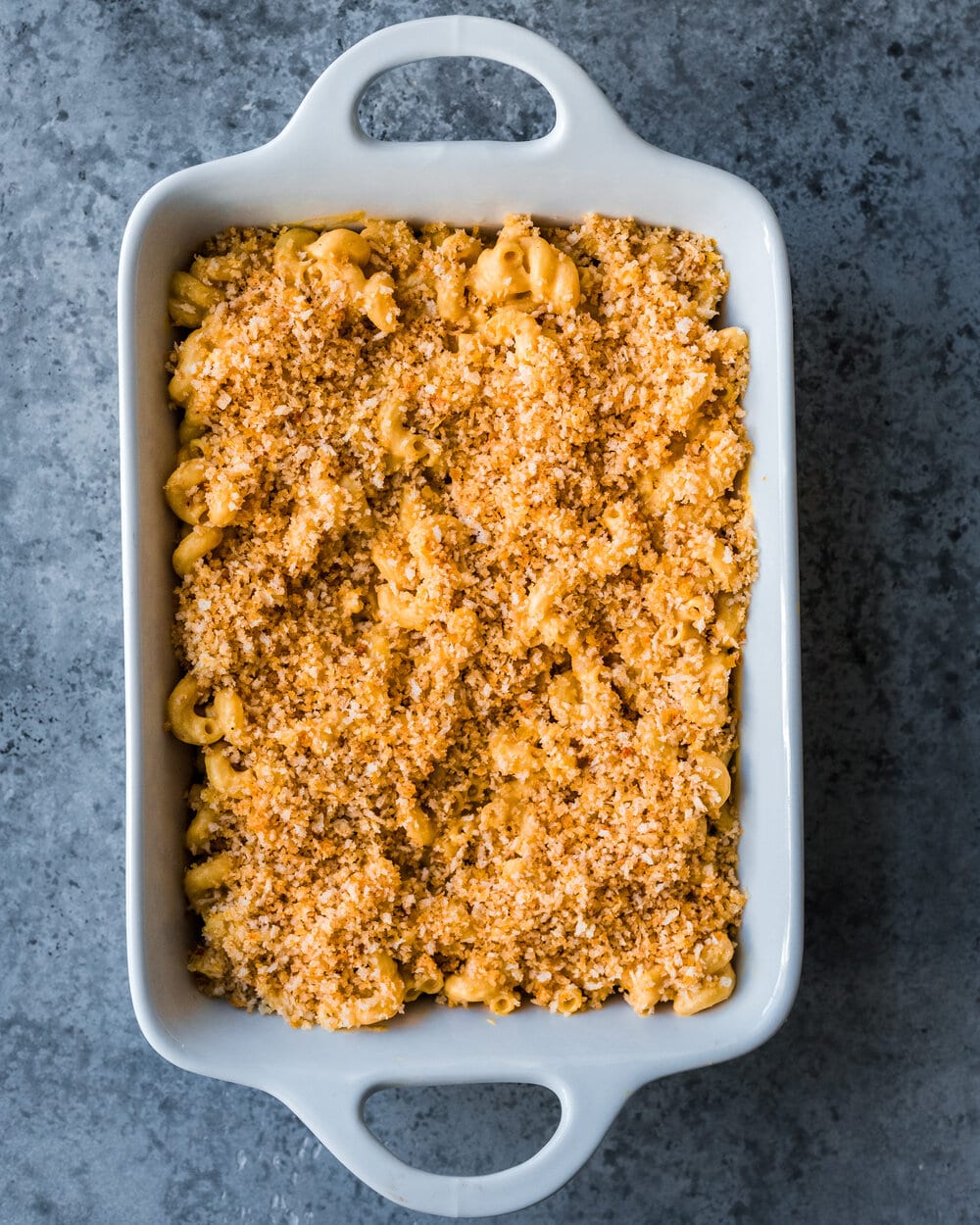 tray of vegan mac and cheese with crispy topping