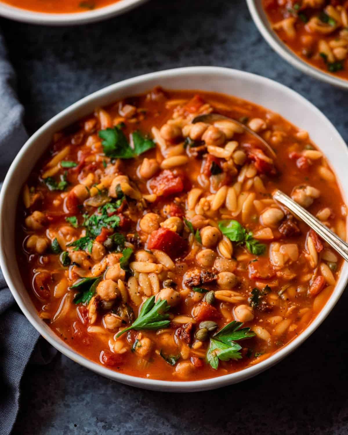 bowl of chickpea orzo soup.