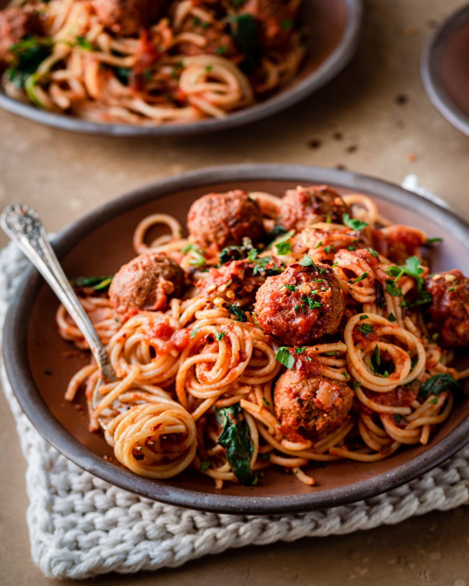 spaghetti and vegan meatballs on a plate