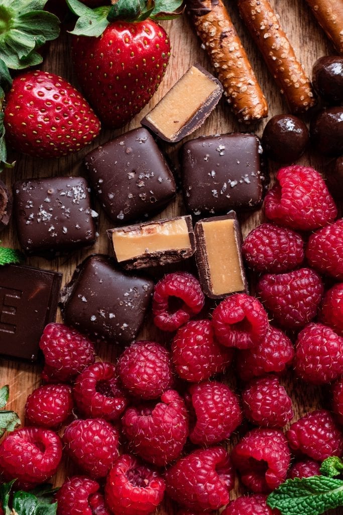 raspberries and chocolate candies