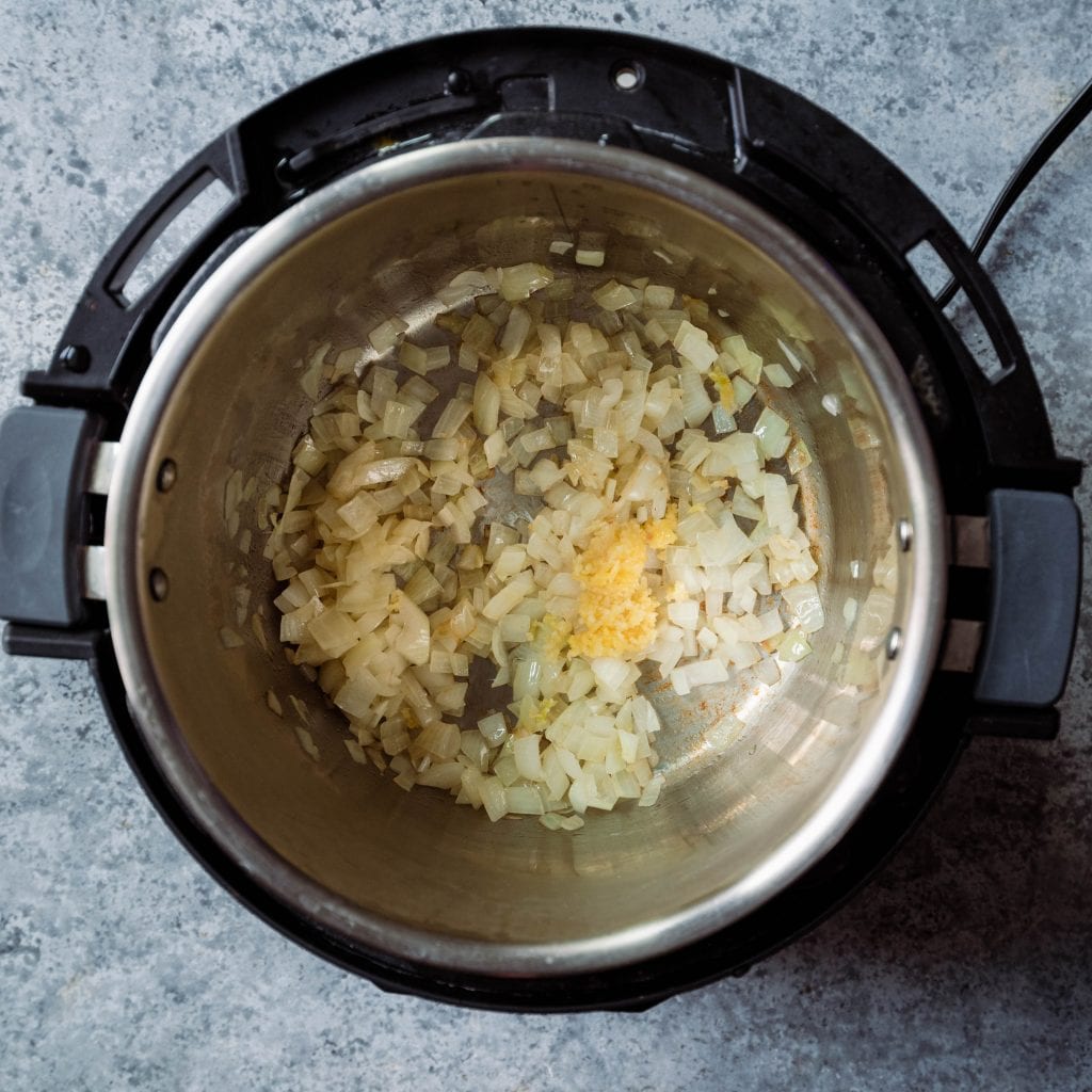 saute onions and garlic in oil in the instant pot