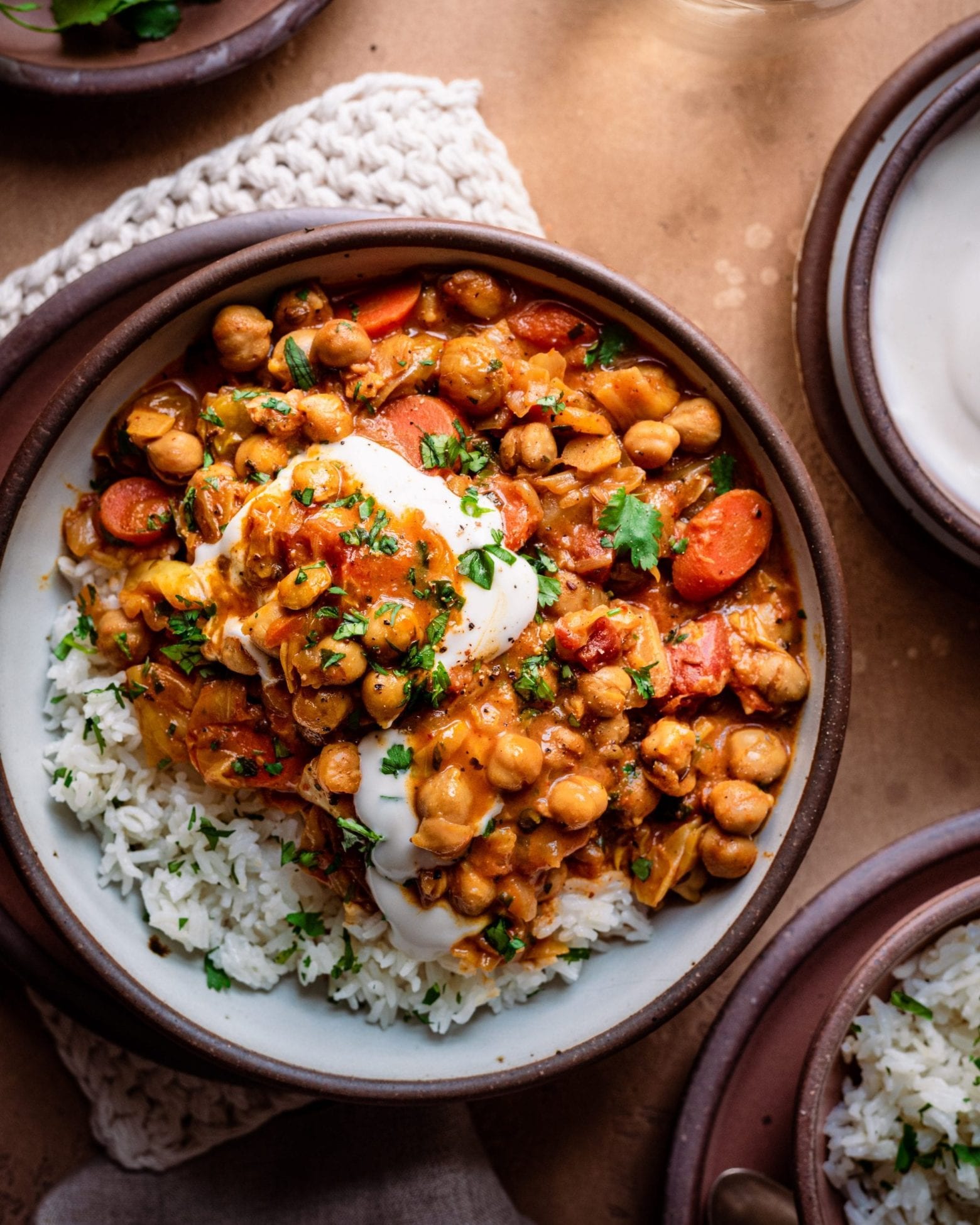 indian chickpea stew in a ceramic bowl served with rice