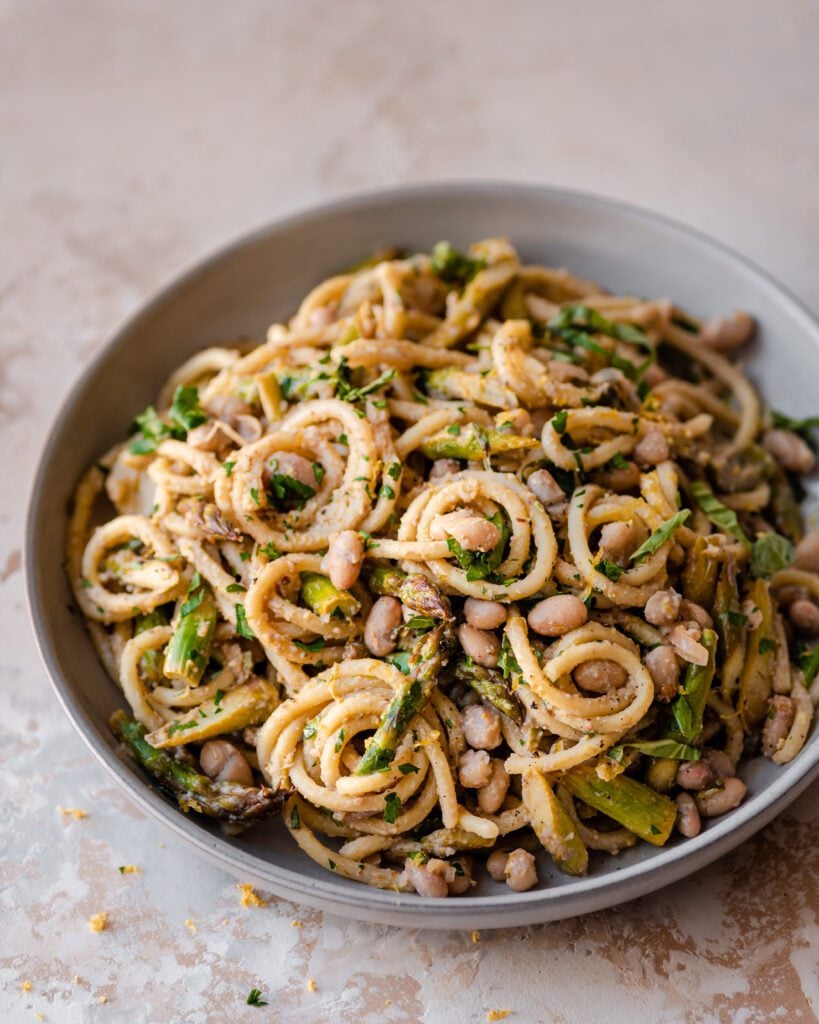 bowl of twirled lemon asparagus pasta 