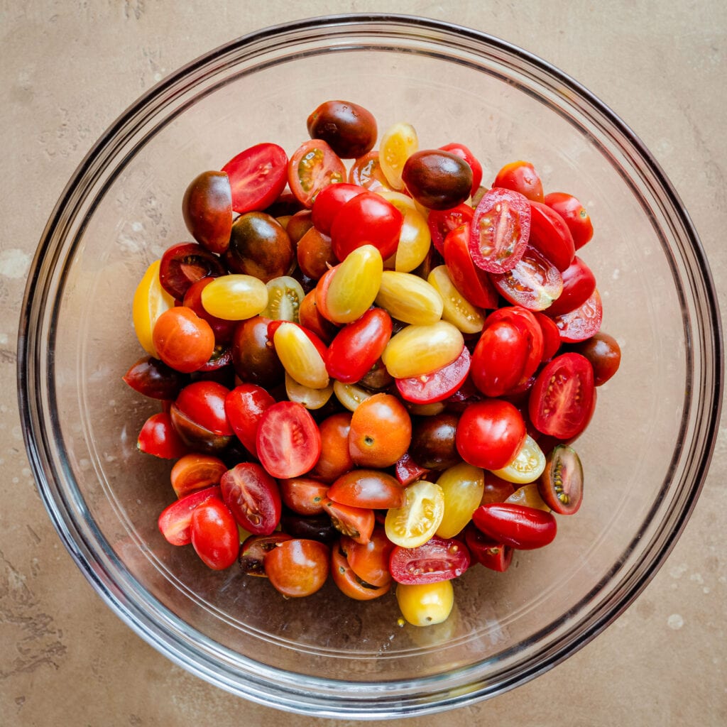 sliced cherry tomatoes in bowl