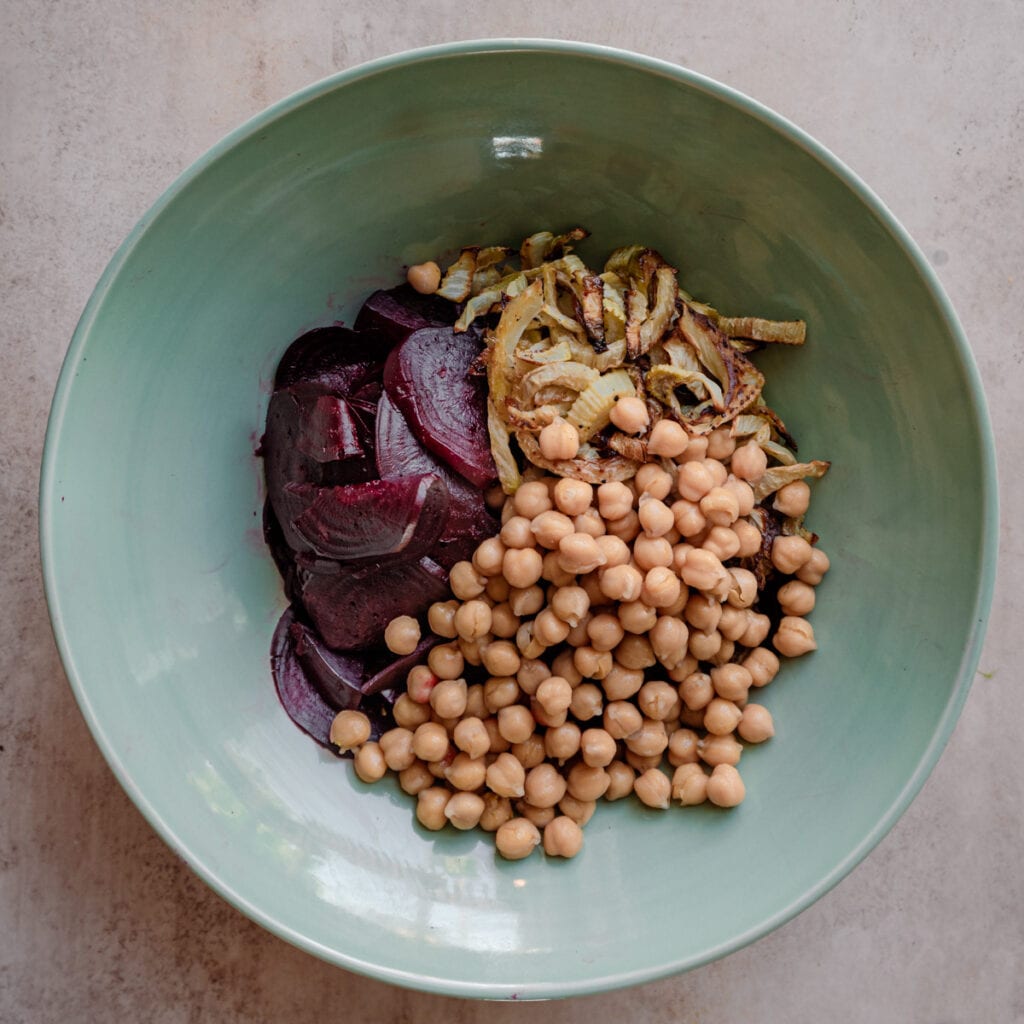 bowl with roasted beets, roasted fennel, and chickpeas