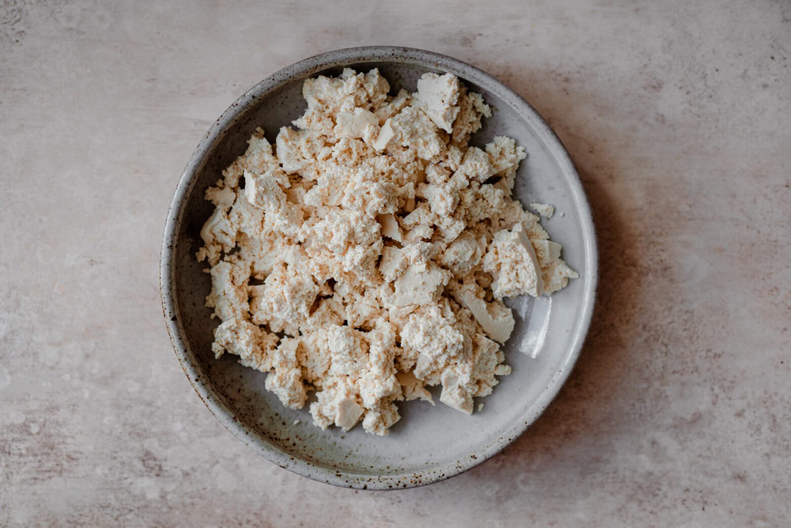 bowl of crumbled firm tofu 