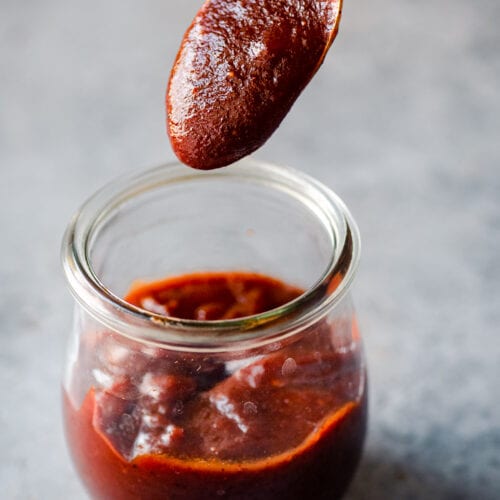 barbecue sauce coating a spoon