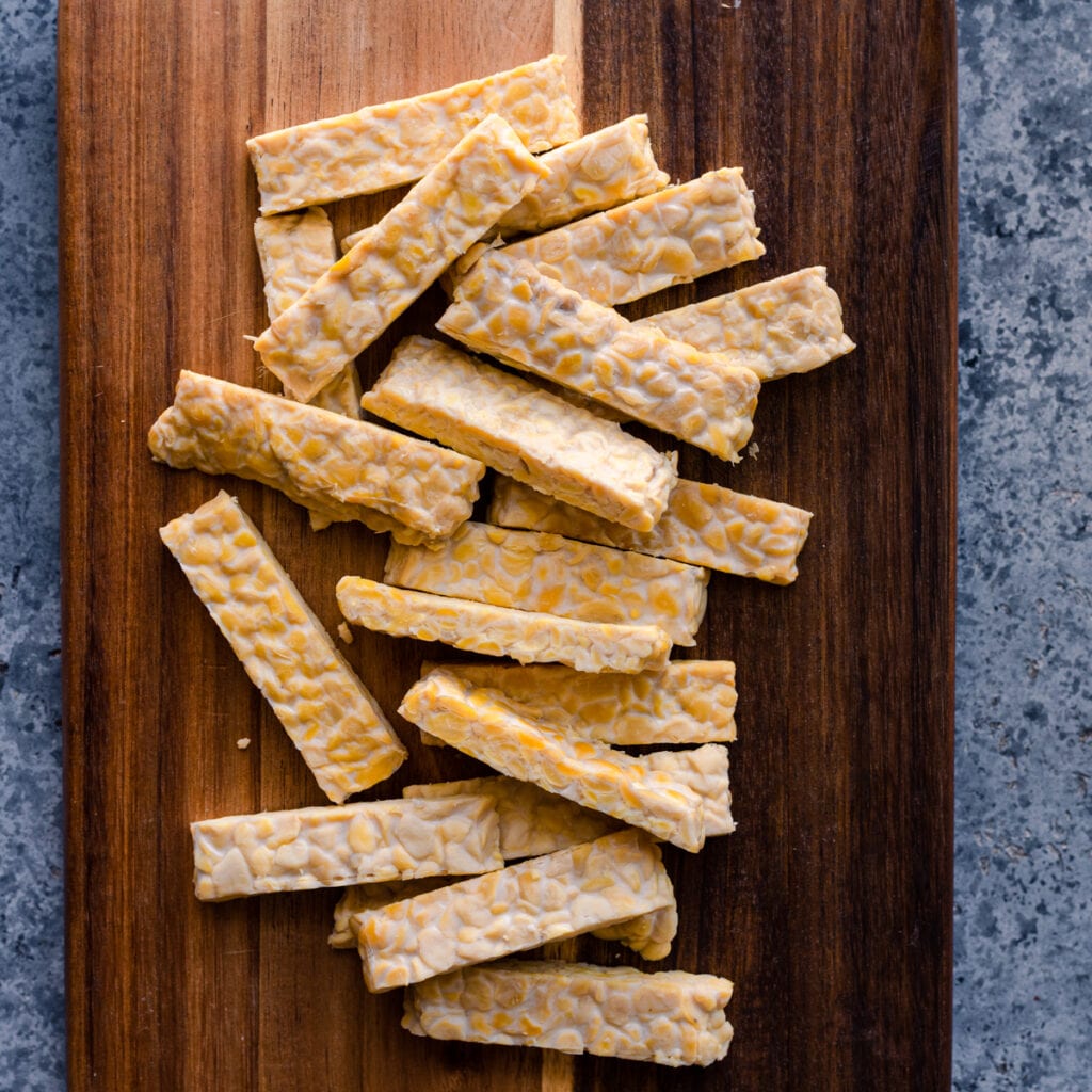 tempeh strips on cutting board