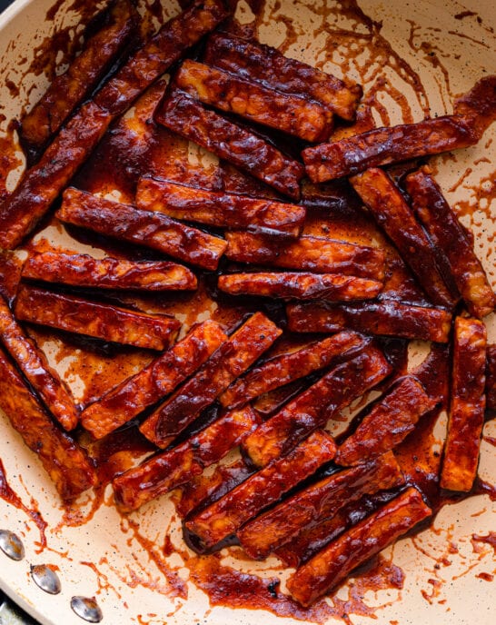closeup photo of barbecue glazed tempeh in frying pan