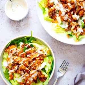BBQ cauliflower salad in white bowls