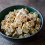 tofu feta in green bowl
