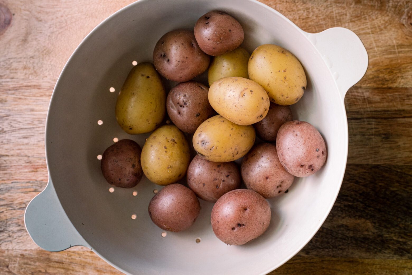 baby potatoes boiled and drained in a colander