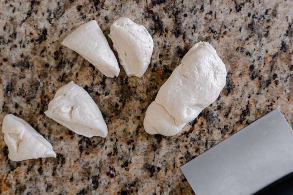 naan dough pieces cut by pastry cutter